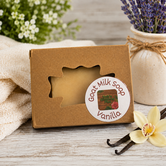 Handcrafted vanilla goat milk soap bar in craft window box with Kait's Giftshop Plus label